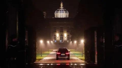 EPA A vehicle carrying the royal family arrives back at Huis ten Bosch palace in The Hague