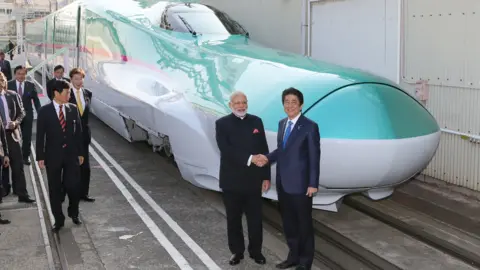 Getty Images Modi and Abe with bullet train