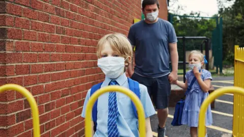 Getty Images child in face mask