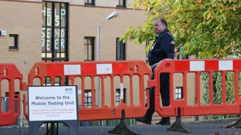 PA Media A mobile testing unit at Murano Street Student Village in Glasgow