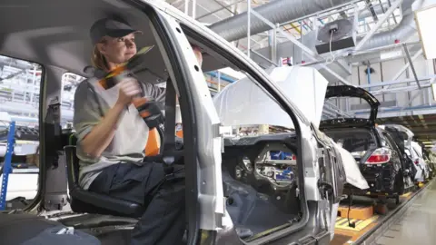 Getty Images Car worker