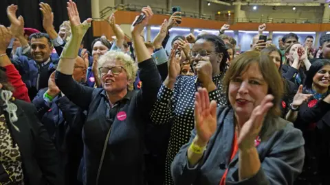 PA Media Cheering supporters