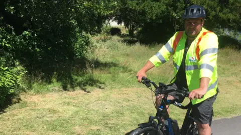 Powys officer on her e-bike