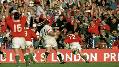 Getty Images Scott Gibbs scores a try