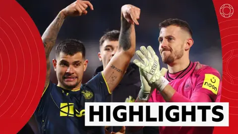 Newcastle's Bruno Guimaraes and Martin Dubravka celebrate their win over Blackburn