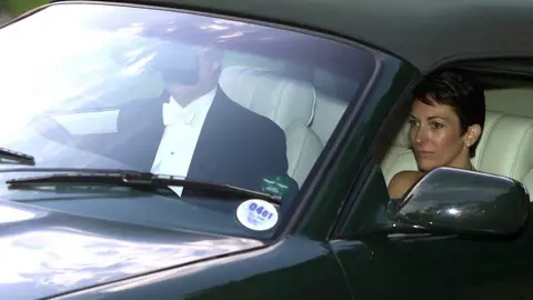 PA Media Duke of York and Ghislaine Maxwell leaving the wedding of Aurelia Cecil in Compton Chamberlayne near Salisbury