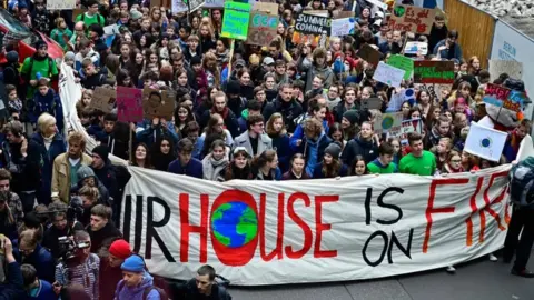 Getty Images Greta Thunberg attends a rally for climate action in Berlin in March 2019