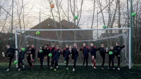 Staff and pupils at John Spence Community High School share their pride in the Newcastle midfielder.