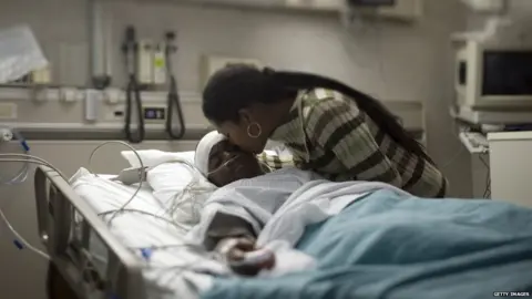 Getty Images Picture of patient with head injury and relative