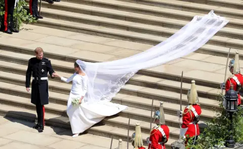 Reuters Prince Harry and Meghan Markle leave St George"s Chapel in Windsor Castle after their wedding