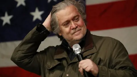 Getty Images Steve Bannon in front of a US flag introduction Republican senatorial candidate Roy Moore at December event