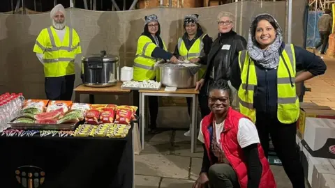 St Basils Staff at St Basils ready to serve food