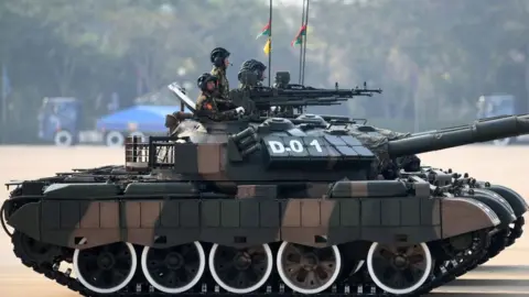 Getty Images A Myanmar military tank on display during an armed forces parade in the capital in 2023