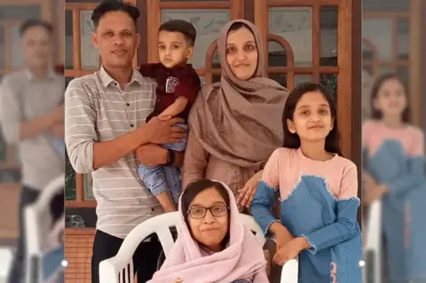 Courtesy PK Rafeeq Afra seen with her family