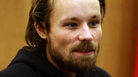 Getty Images German journalist Billy Six during a press conference in Damascus were he was handed over to the Russian embassy by Syrian Deputy Foreign Minister Faisal Muqdad on March 5, 2013