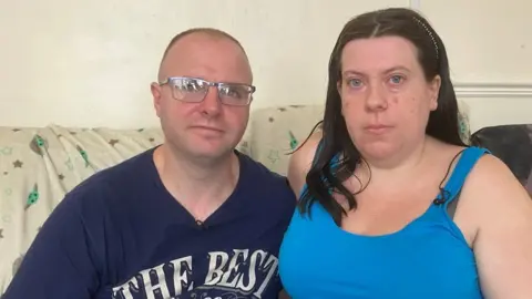 Mark Lewis and Emily Morris, stepdad and mum of baby Alvin Morris