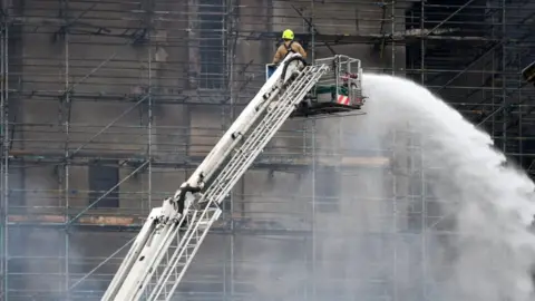 Getty Images Fire crews at the scene