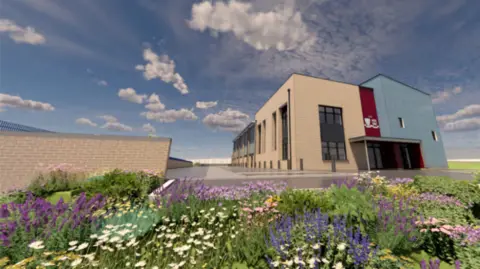 The image shows the outside of a school building, where plants and other flowers can also be seen. Clouds can be seen sparsely across the blue sky.