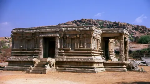 Getty Images The Vittala Temple, built in the early 16th century, is devoted to the Hindu god Vithoba (also known as Vitthala and Panduranga), an incarnation of Vishnu or his avatar Krishna. Hampi is a town in northern Karnataka state.