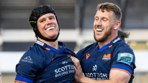 Edinburgh celebrate Darcy Graham's third try