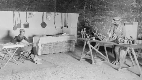 University of Liverpool Professor John Garstang (right) and a colleague with Egyptian artefacts 