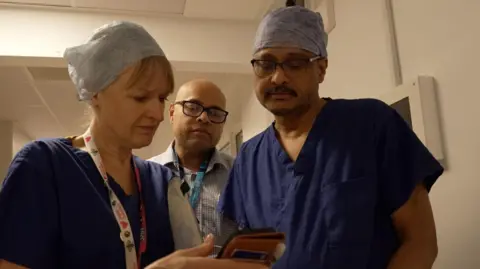 Consultant lung surgeon Vasudev Pai and team