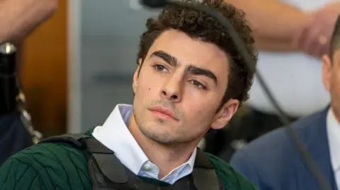 Luigi Mangione attends a hearing at Manhattan Criminal Court on February 21, 2025 in New York City