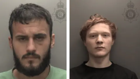 Two custody photographs of men side by side. On the left is a man with short black hair, a black beard and moustache frowning as he looks into the camera wearing a green top. On the right is a man with ginger hair and a black top leaning against a grey wall.