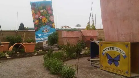 The inside of the former Butterfly World site, showing giant garden pots, matches and garden seeds