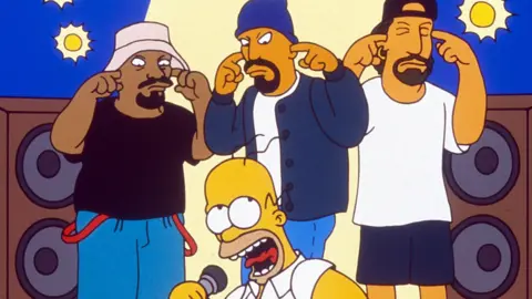 Cartoon Cypress Hill characters with their fingers in their ears and Homer Simpson singing