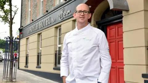 Brian McDermott Brian McDermott outside his closed hotel