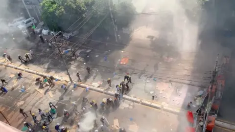 Reuters Tear gas and smoke bombs as protesters clash with police