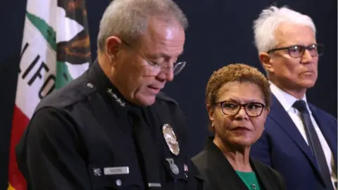 Getty Images From left: LAPD Chief Michael Moore, LA Mayor Karen Bass and District Attorney George Gascon