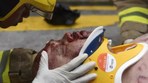 EPA Injured man in Hong Kong, 6 October