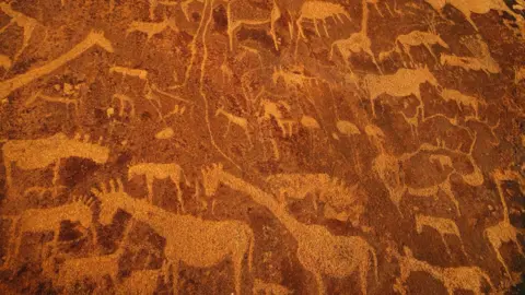 Getty Images Rock art engravings at Twyfelfontein World Heritage Site at Uibasen Conservancy, Damaraland, Namibia