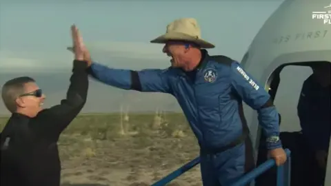 Blue Origin Mr Bezos was delighted as he stepped out of the capsule after landing