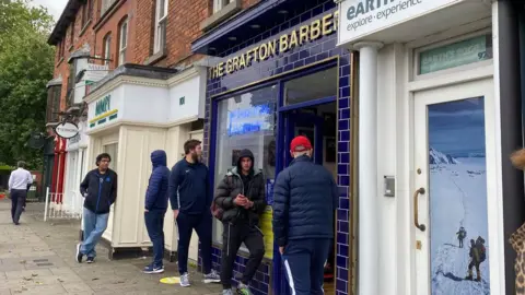 Queue outside Grafton Barbers in Donnybrook