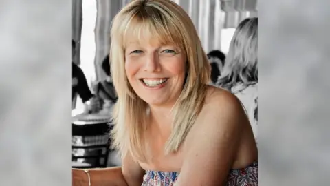 Family handout A woman smiling at the camera with blonde hair