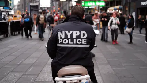 Getty Images The back of a New York City Police officer on a motorbike