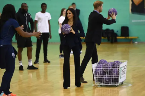 Getty Images The Duke and Duchess of Sussex playing basketball at Loughborough University in September