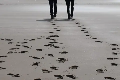 Jenny Mill Walking on the beach