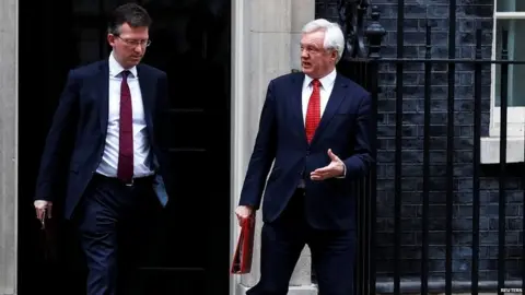 Reuters Brexit Secretary David Davis (right) and Attorney General Jeremy Wright leaving a cabinet meeting