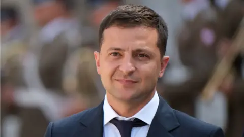 Getty Images Ukrainian President Zelensky wears a formal suit at an official event