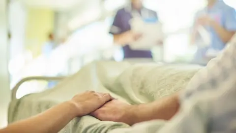 Getty Images Person being treated in hospital