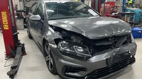 BBC A police car that was rammed