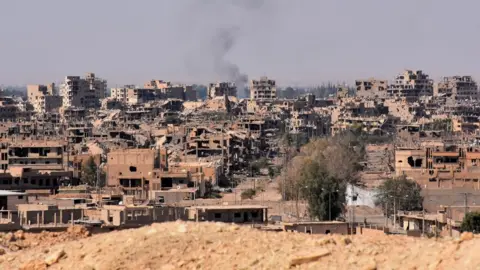 AFP A general view of the eastern Syrian city of Deir al-Zour on 11 September 2017