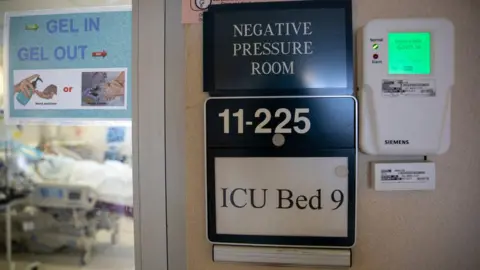 Getty Images A Covid-19 patient lies in the ICU at the Veterans Affairs Medical Center on April 2 in the Brooklyn, New York