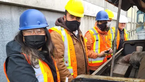 H2M Grace Quan (front) and team