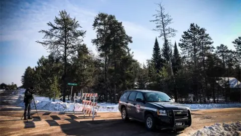 AFP/Getty Images A police car blocks the road where teenager Jayme Closs was found on January 11, 2019 in Gordon, Wisconsin