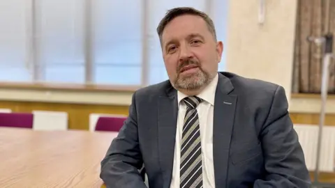 PA Media Robin Swann